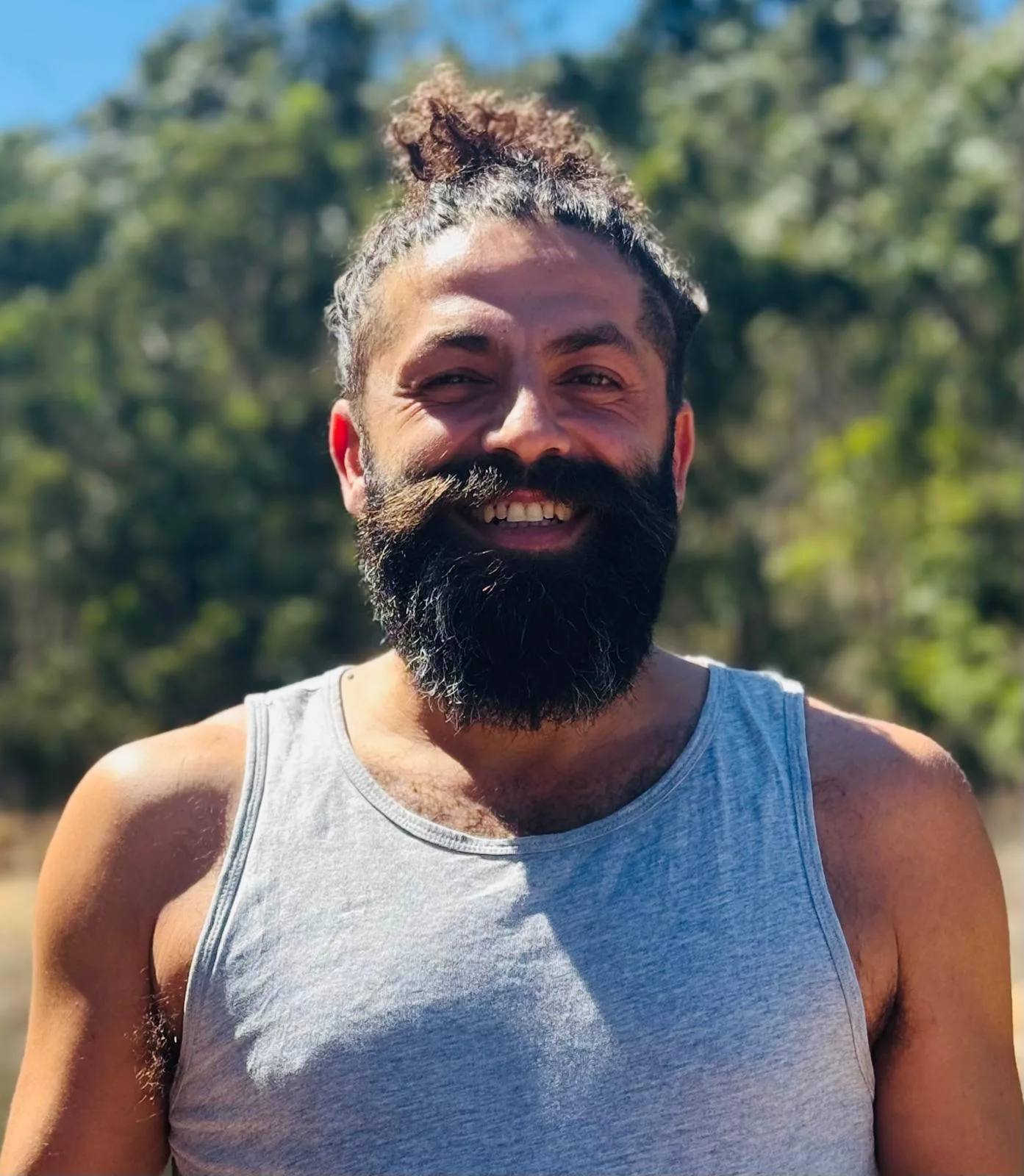 Charbel from From Tension to Play and a client mid-session, caught laughing